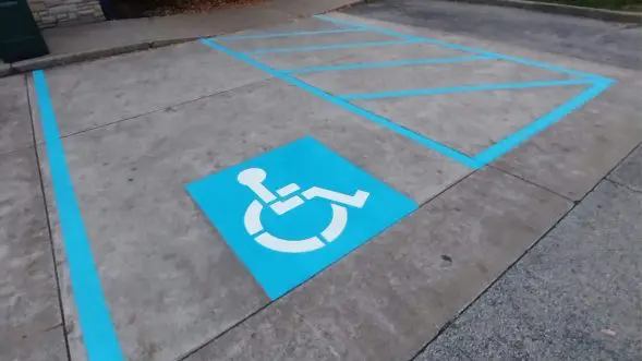 image of ada compliant parking stalls line painting by everline