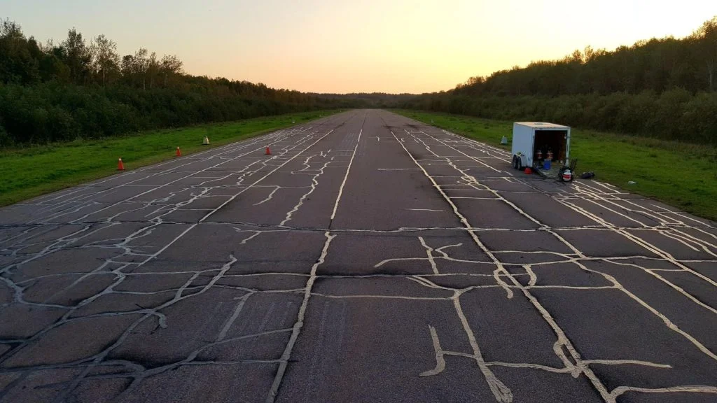 image of a damaged asphalt road