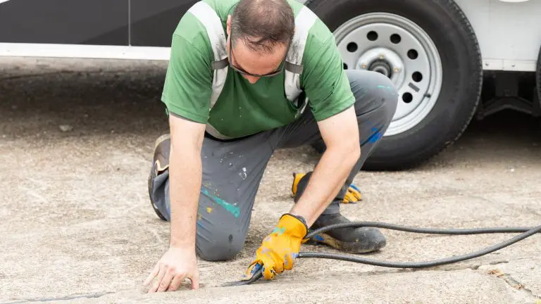 image of everline specialist doing concrete joint sealing