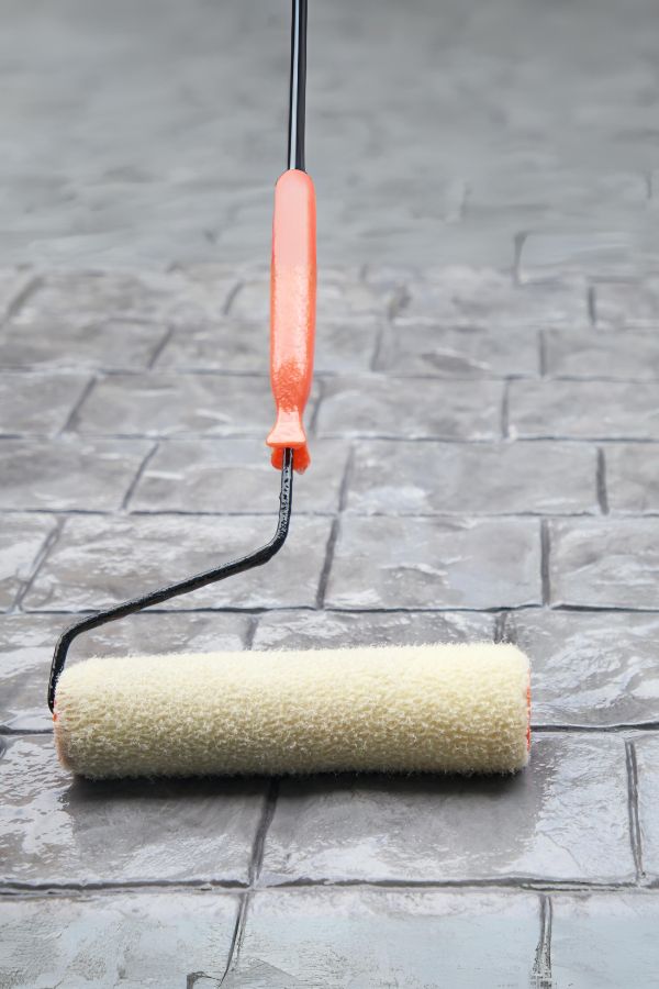 image of everline specialist doing concrete sealing