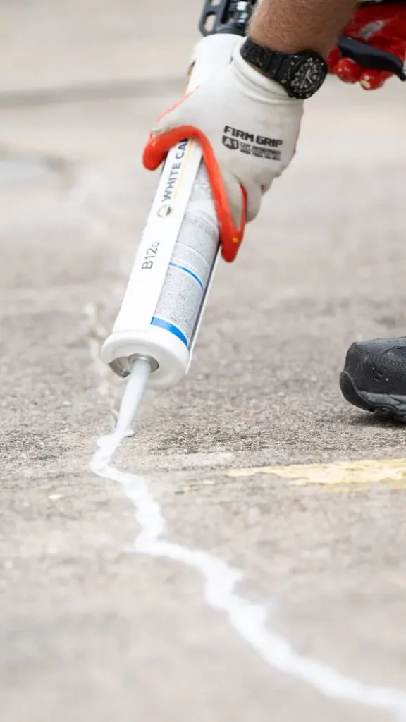 image of everline specialist doing concrete sealing