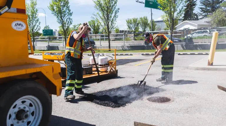 image of everline specialist doing infrared asphalt repair