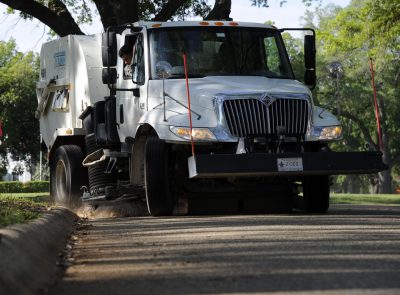 image of parking lot sweeping truck