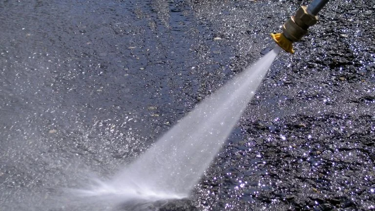 image of power washing road